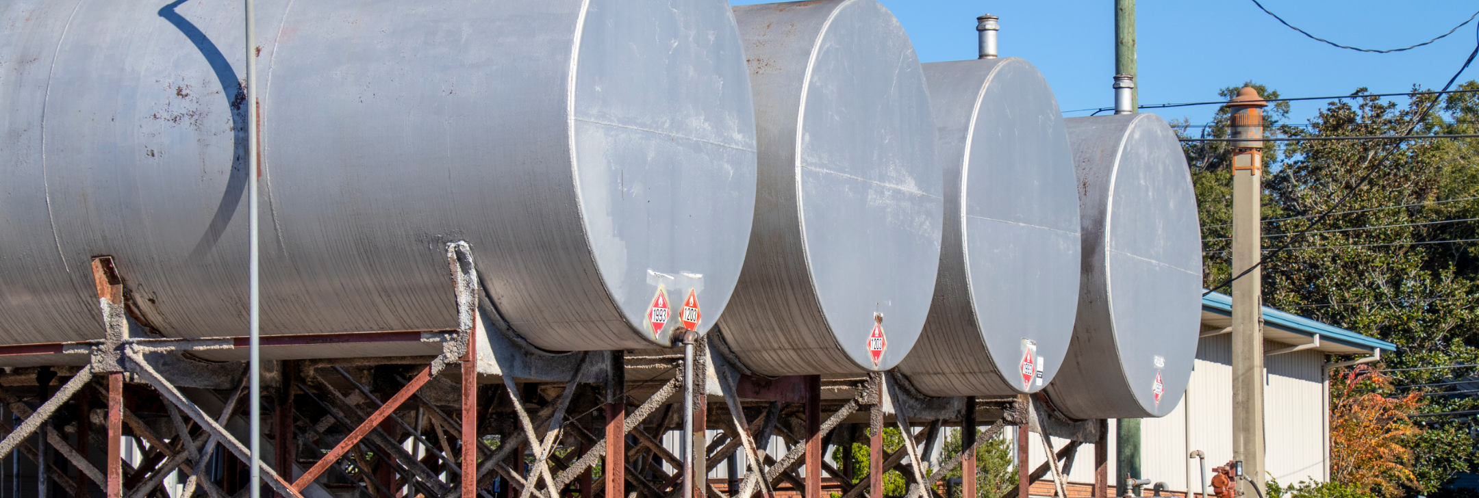 Four large holding tanks.