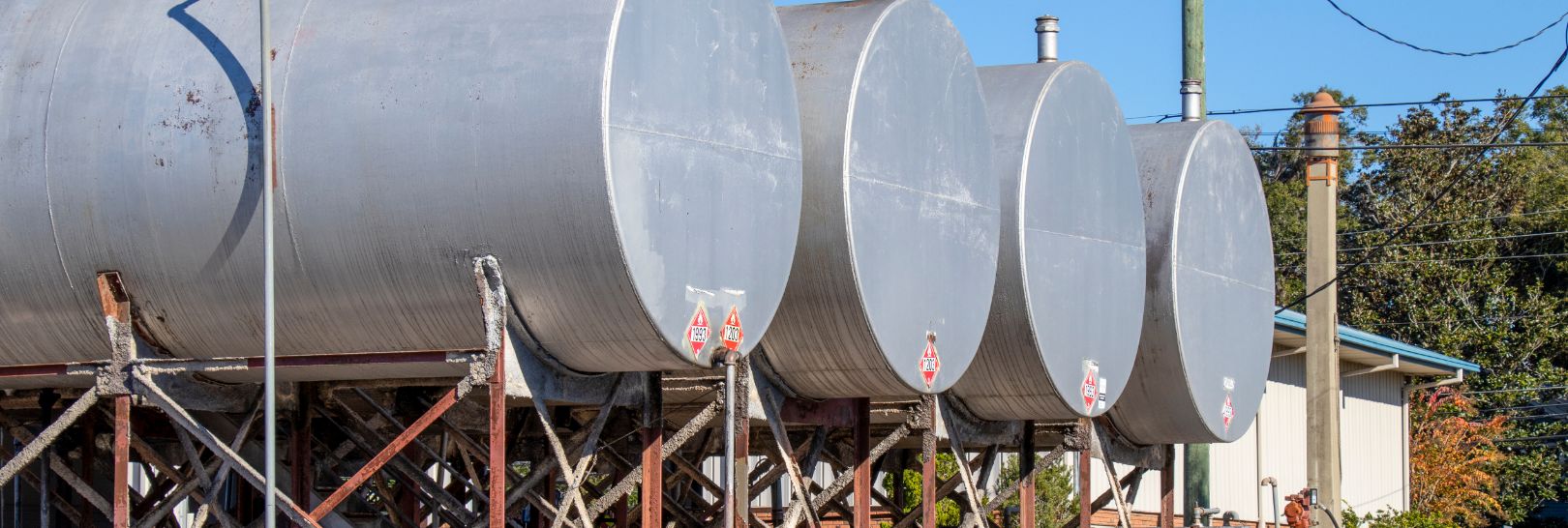 Four large holding tanks.